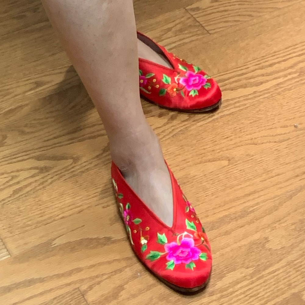 Chinese fabric flats with fine floral embroidery.